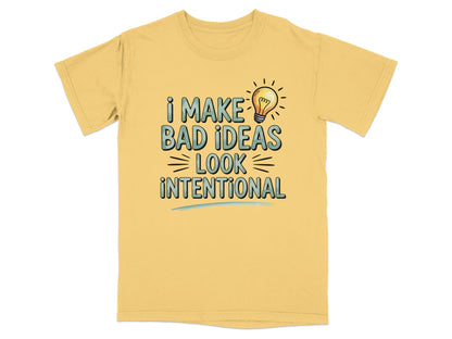 Yellow t-shirt with "I MAKE BAD IDEAS LOOK INTENTIONAL" and a lightbulb.