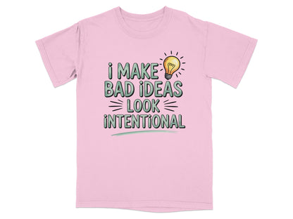 Pink t-shirt with "I MAKE BAD IDEAS LOOK INTENTIONAL" and a lightbulb graphic.