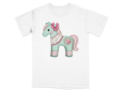 White t-shirt with a cartoon horse graphic featuring pastel colors and floral accents.