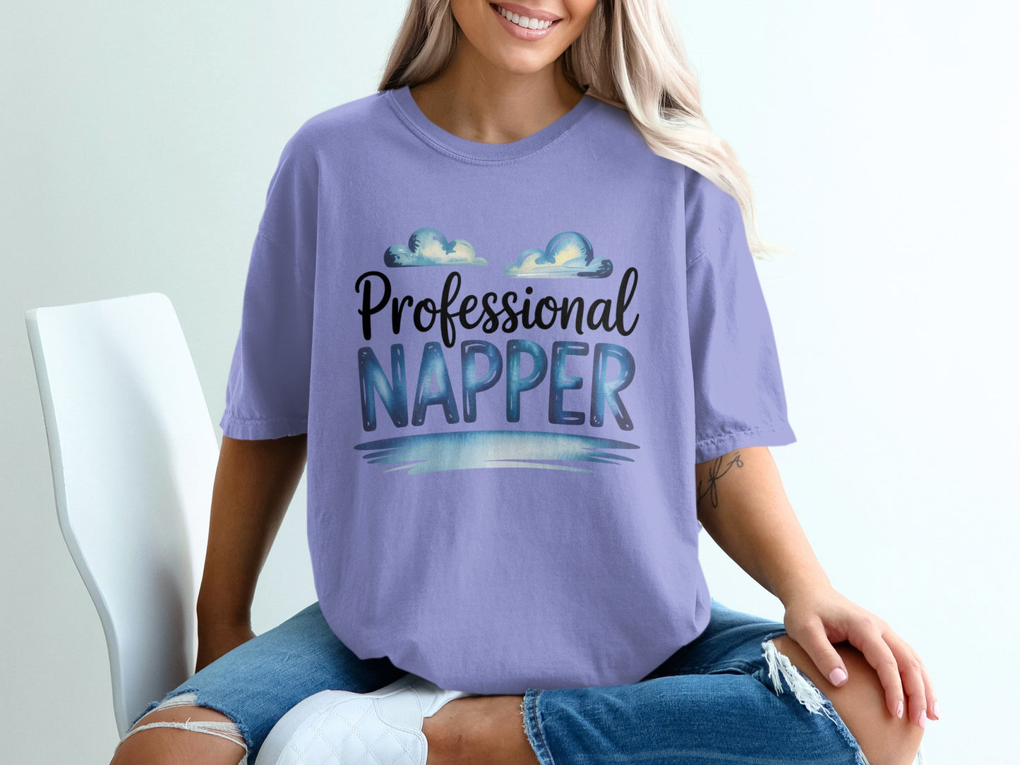 Lavender t-shirt with "Professional Napper" text and cloud graphic.