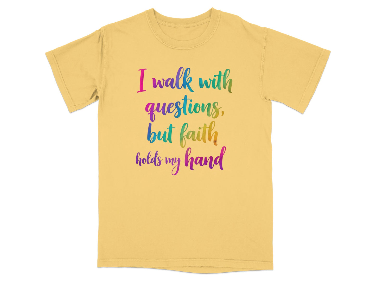 Yellow t-shirt with colorful text "I walk with questions, but faith holds my hand".