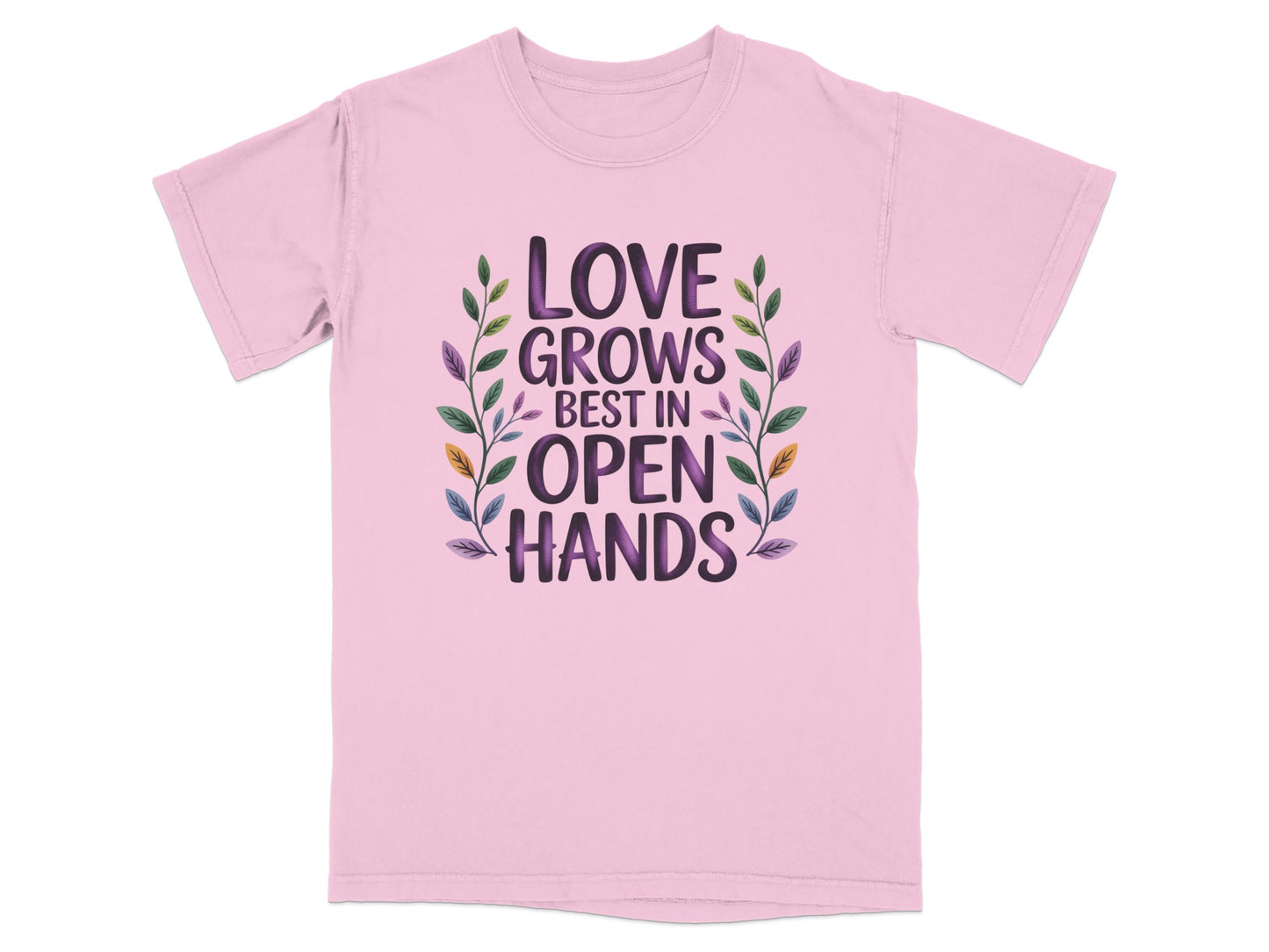 Pink t-shirt with "Love Grows Best in Open Hands" text and floral design.