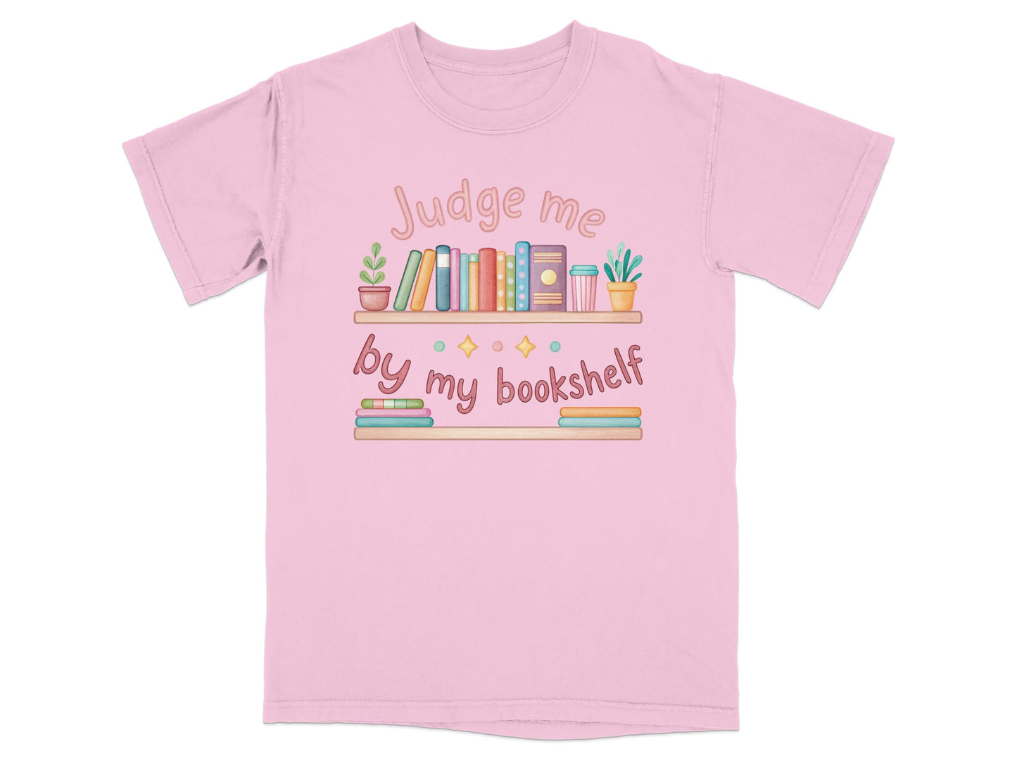 Pink t-shirt with "Judge me by my bookshelf" and a cartoon bookshelf.