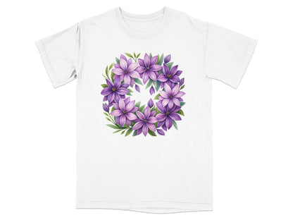 White t-shirt with a circular floral design of purple clematis flowers.
