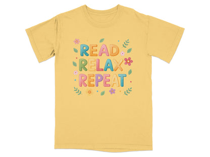 Yellow t-shirt with "Read Relax Repeat" text and floral accents.
