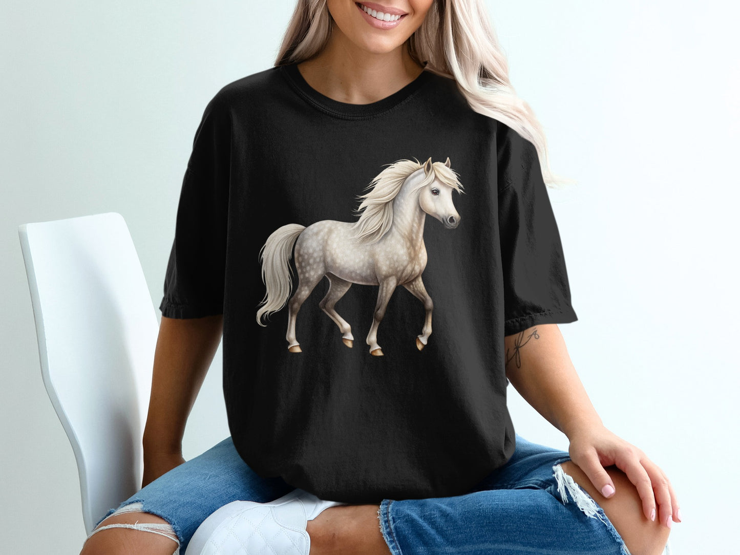 Black t-shirt with a white horse graphic on the front.