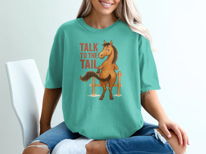 Teal t-shirt with a cartoon horse and "Talk to the Tail" text.