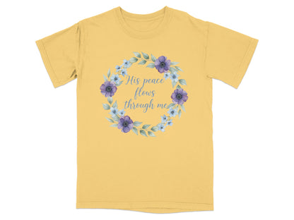 Yellow t-shirt with floral wreath and "His peace flows through me" text.