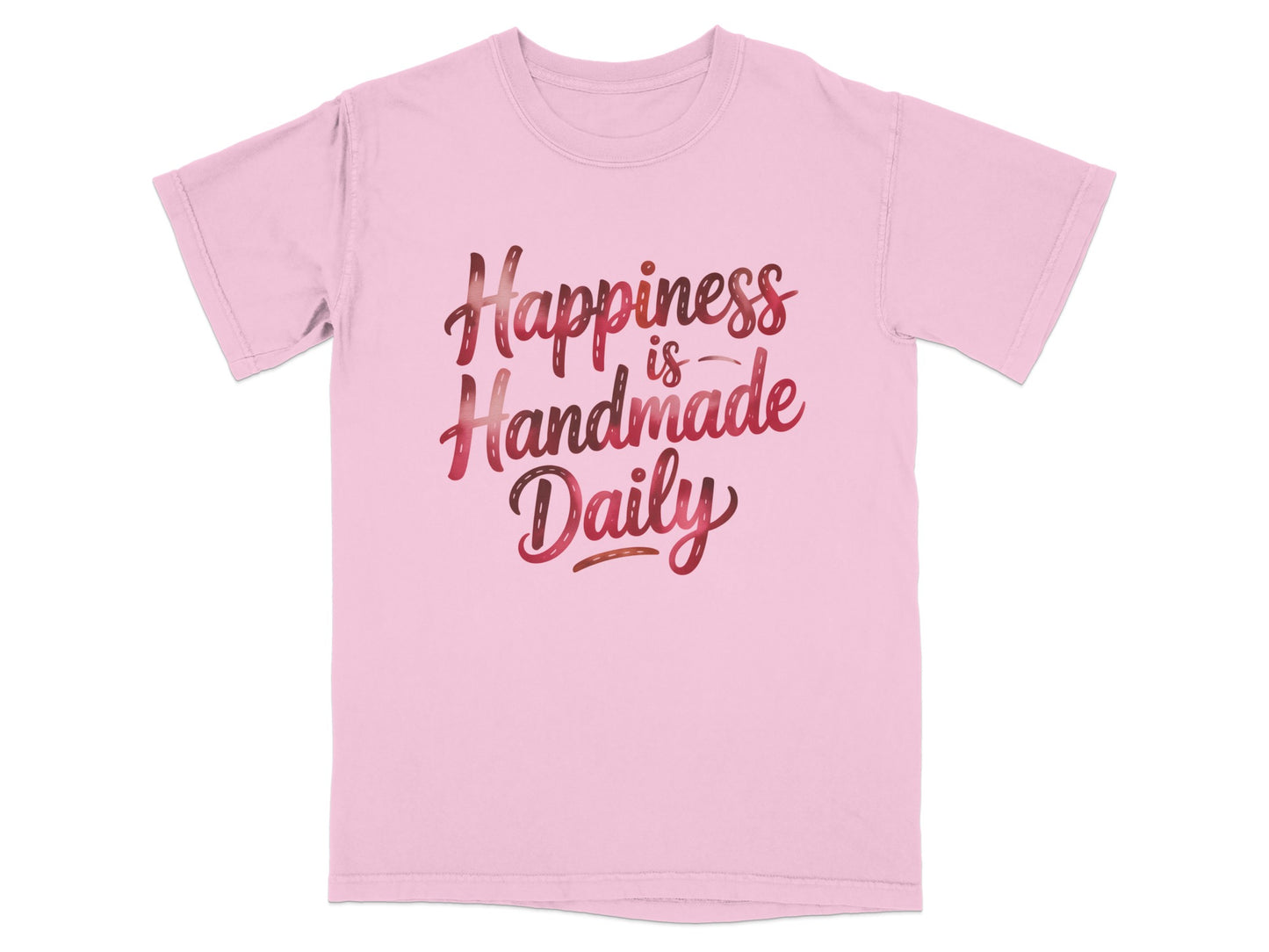 Pink t-shirt with "Happiness is Handmade Daily" text in decorative lettering.