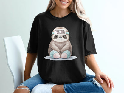 Black t-shirt with a tired sloth wearing a headband that says "TOO TIRED TO BE FAKE".