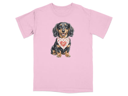 Pink t-shirt featuring a dachshund wearing a heart-patterned bandana.