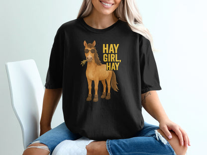 Black t-shirt with cartoon horse wearing sunglasses and text "HAY GIRL, HAY".