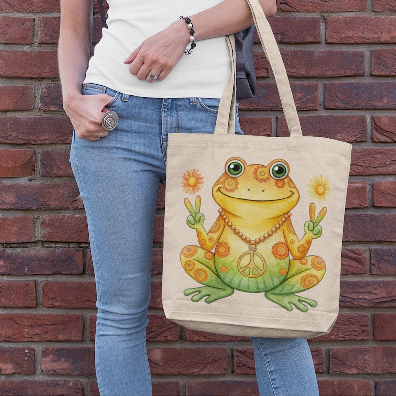 Yellow peace sign frog design shown on a tote bag